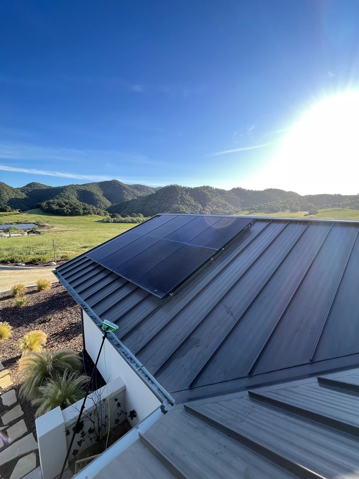 Clean solar panels on a sunny rooftop